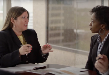 GRP President + CEO Jennifer Wakefield talks business relocation with a client