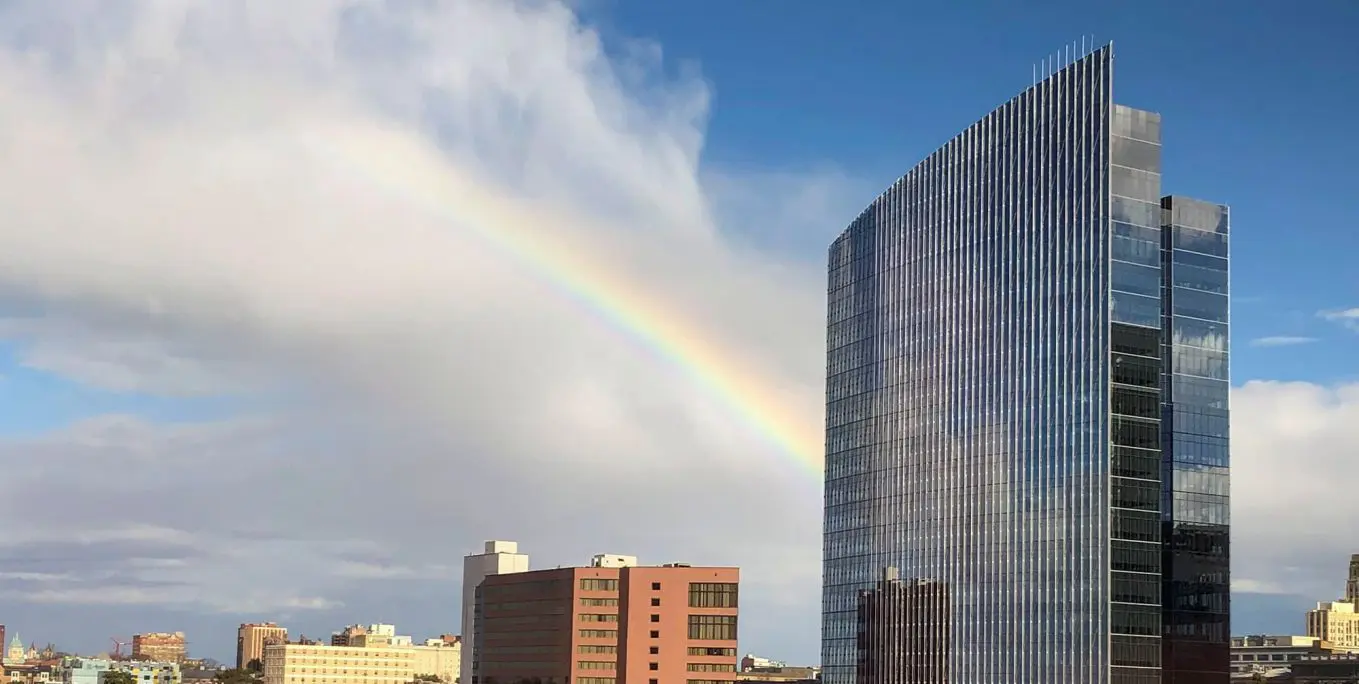 Dominion Energy building with rainbow