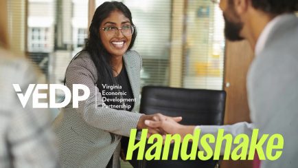 people shaking hands in
