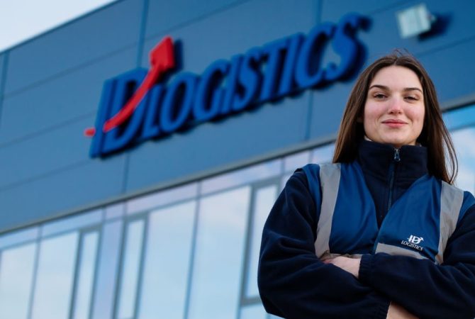 ID logistics woman in front of distribution center