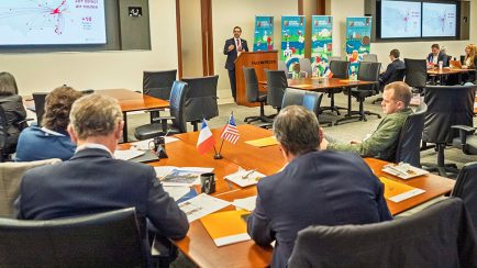 French delegation listening to Jose Romano Speak