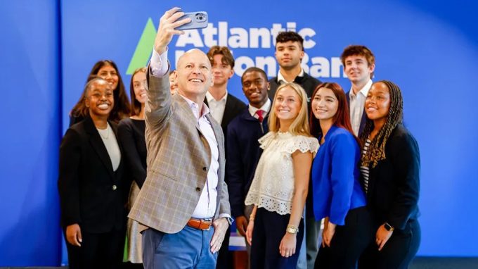Atlantic Union Bank President takes selfie with interns